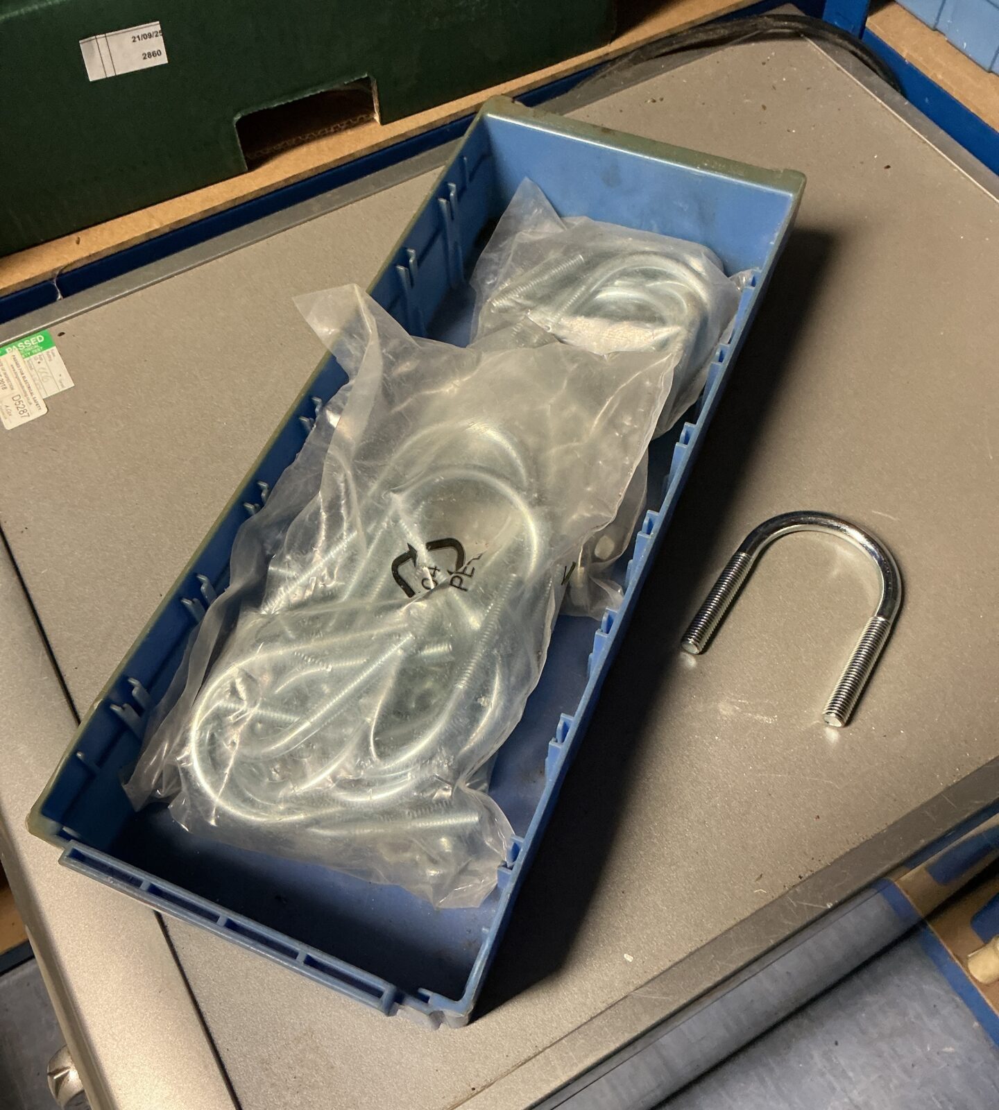 Tray of two packs of new U-bolts