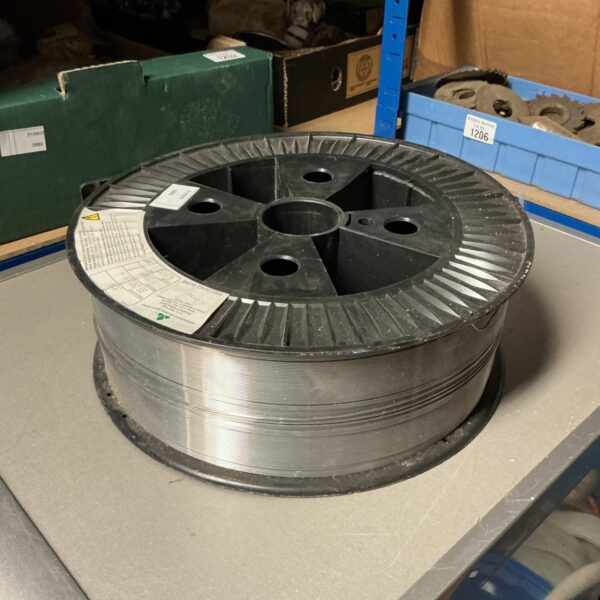 Close-up of a steel welding wire roll for MIG welding.