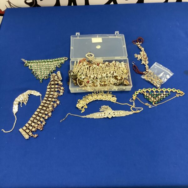 Mixed lot of colourful costume jewellery including necklaces and earrings.