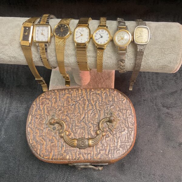 Leather box containing a collection of vintage ladies’ wristwatches.