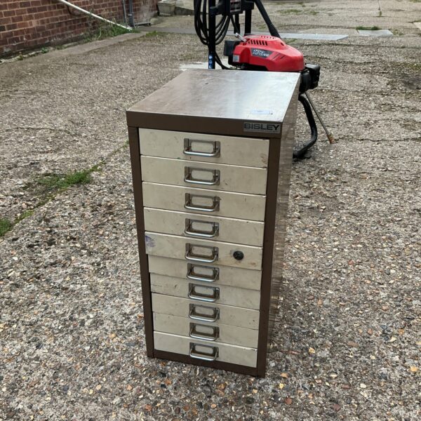 Vintage metal Bisley machinist drawers for workshop storage.