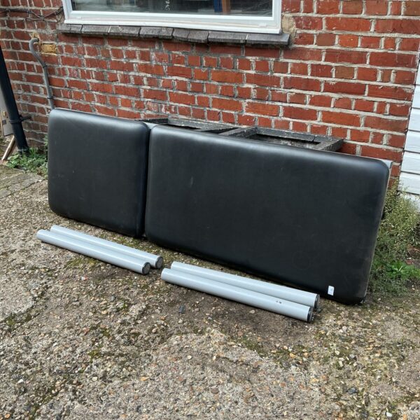 Black faux leather massage table
