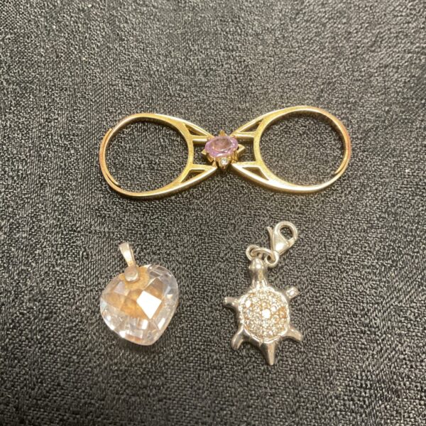 Unusual double reversible ring and two silver pendants