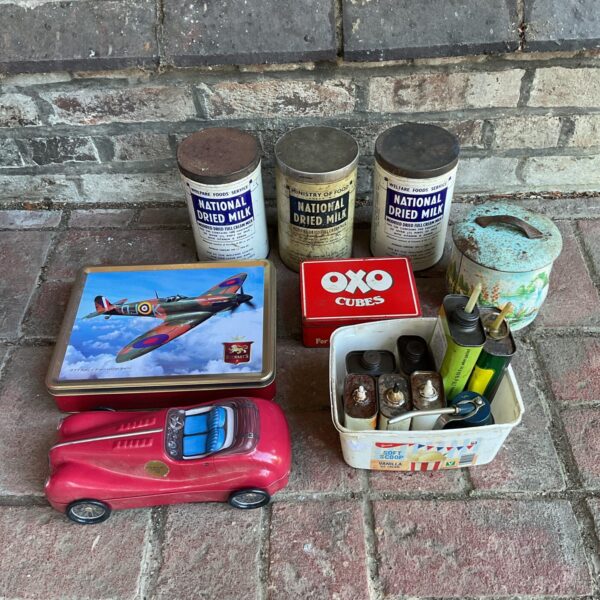 Collection of vintage tin & oil cans including national dried milk cans