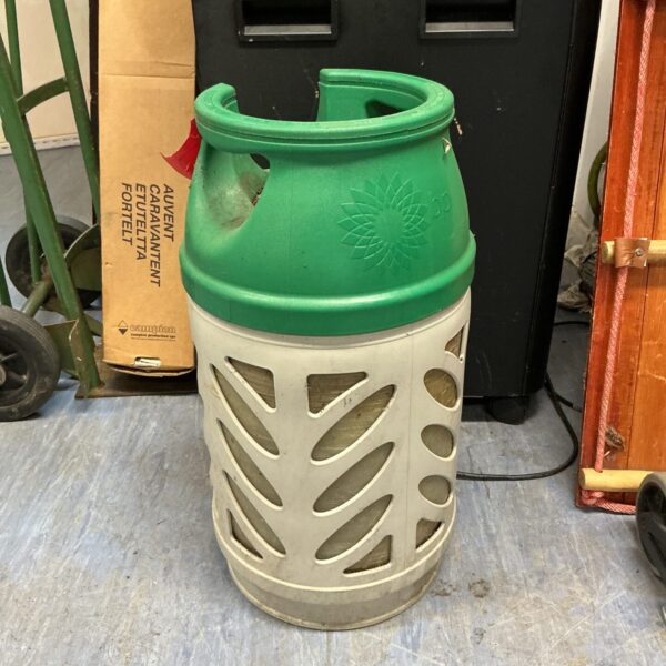 Vintage gas bottle for propane or LPG, showing signs of wear.