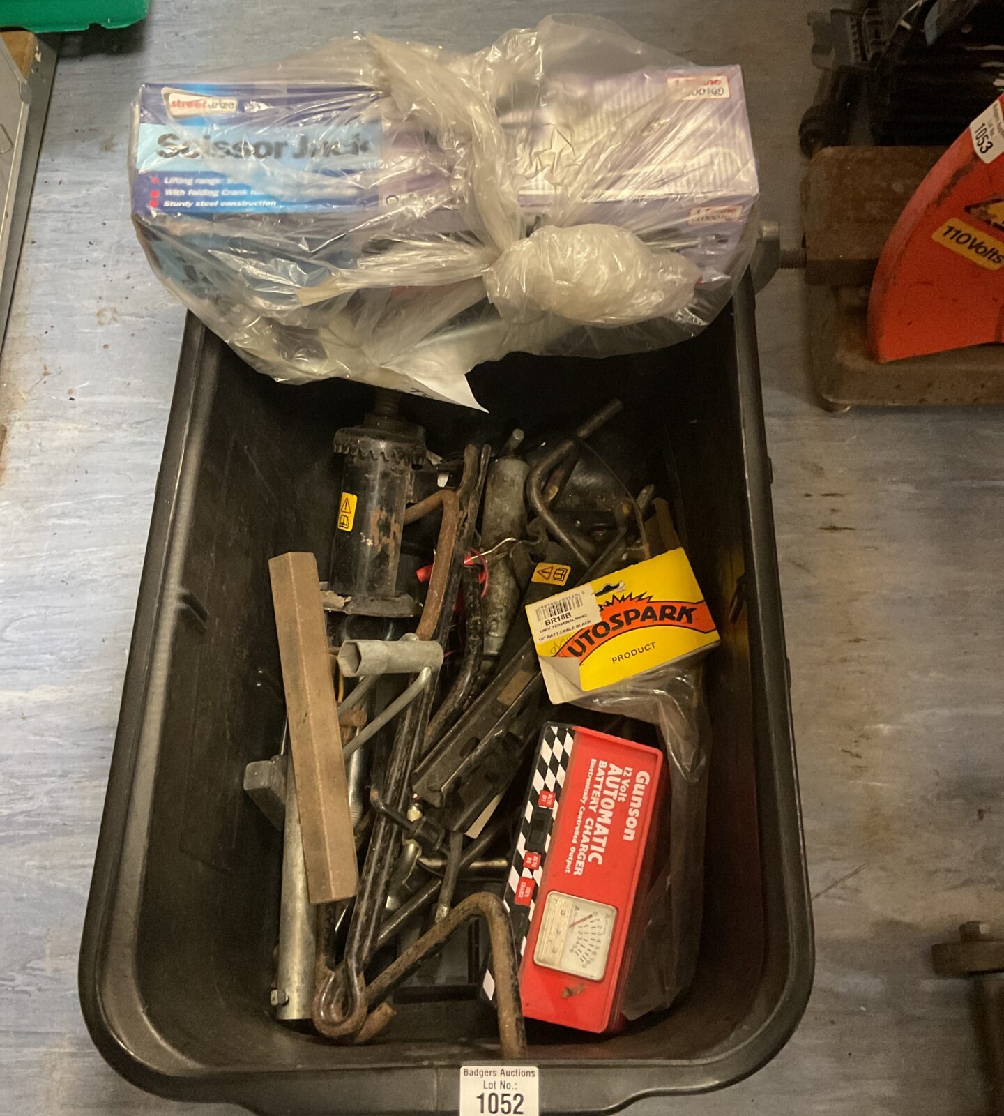 Crate of car jacks Inc  scissor jacks and gunson automatic battery charger
