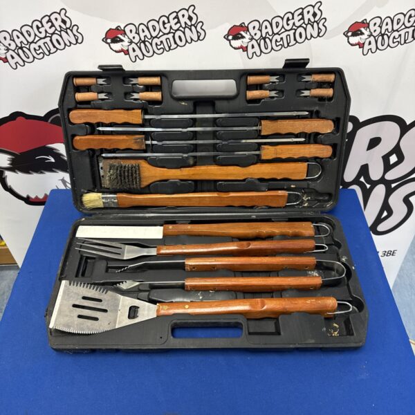Closed black BBQ utensil set with wooden handle.