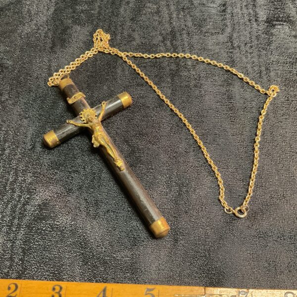 Antique Victorian crucifix necklace with gilt brass detailing.