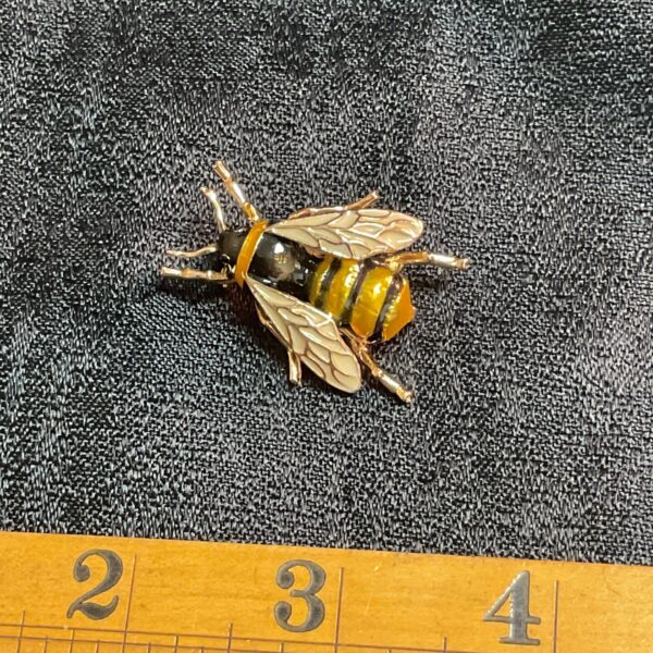 Detailed vintage honeybee brooch with enamel wings.
