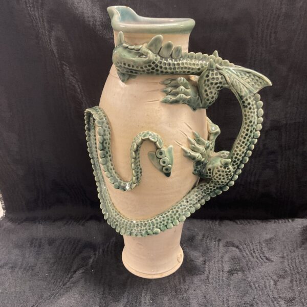 Large Dawes Studio Pottery ceramic jug with a detailed dragon handle.
