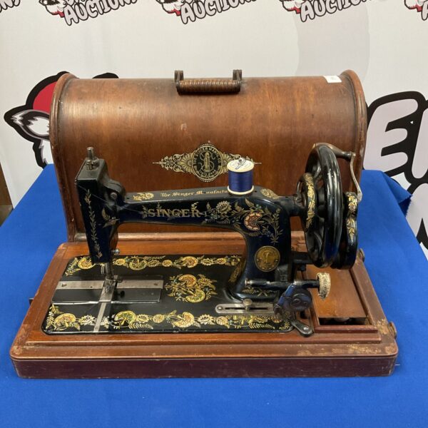 Antique singer hand cranked sewing machine