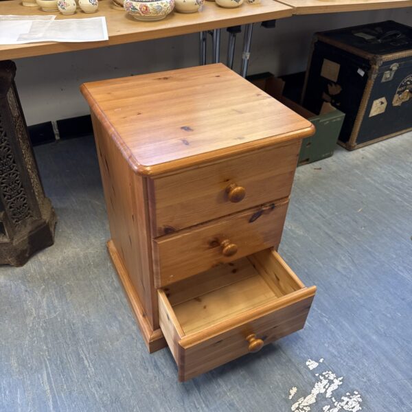Pine three drawer bedroom cabinet
