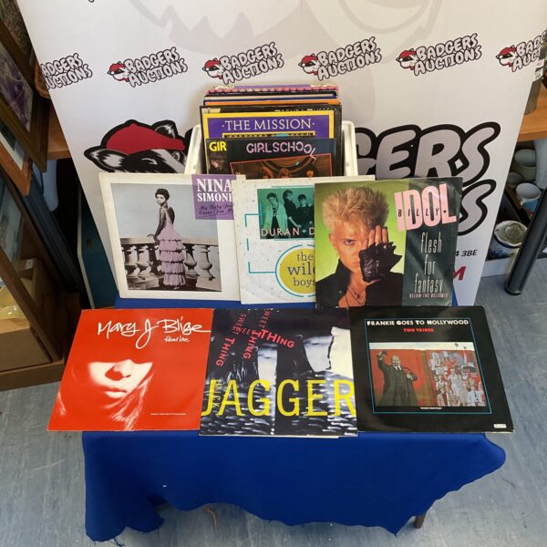 Collection of 12 inch vinyl singles, rock and pop music.