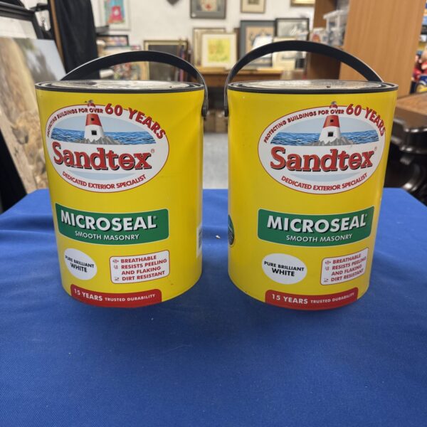 Two tubs of Sandtex Microseal brilliant white masonry paint.