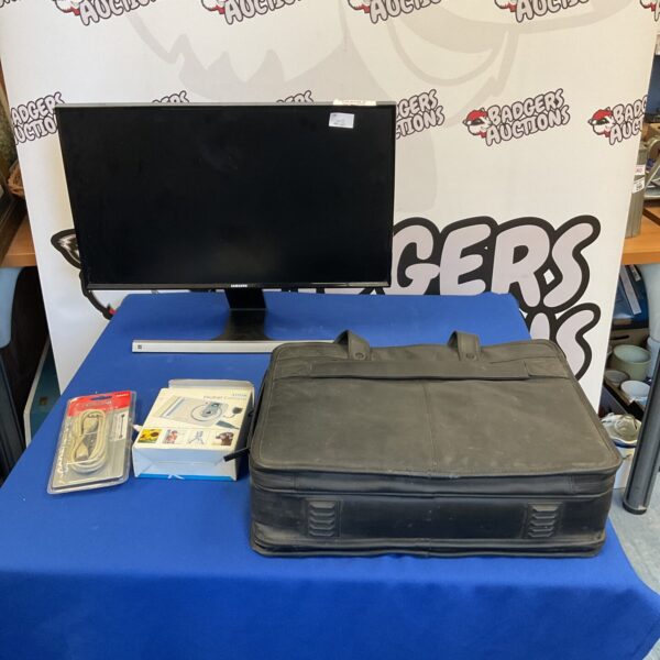 Samsung monitor, digital camera, and Dell bag in a tech bundle.
