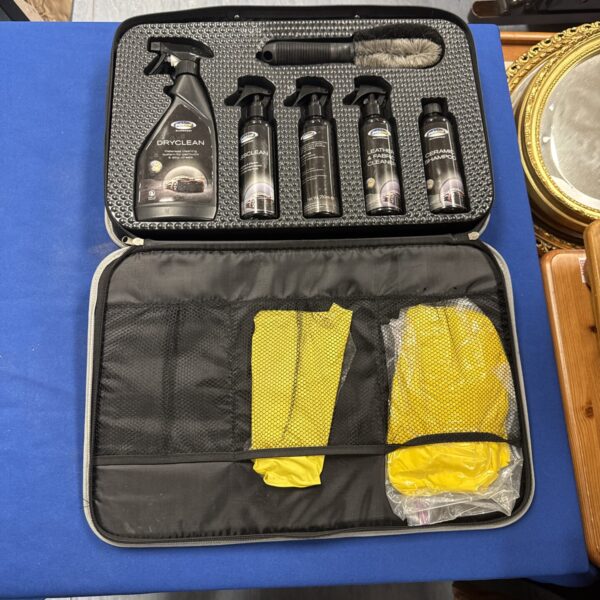 Paintseal car cleaning kit with spray bottles and cleaning supplies.