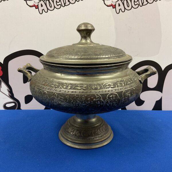 Large vintage Asian lidded pot with silver plate detailing.