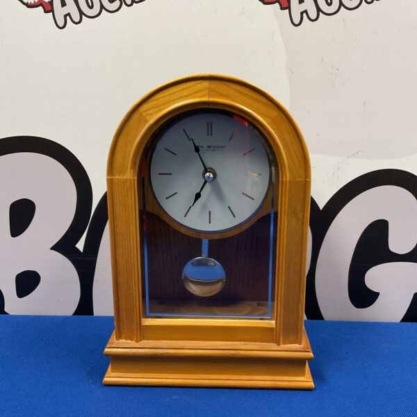 Vintage W m Widdop quartz mantle clock in wooden case.