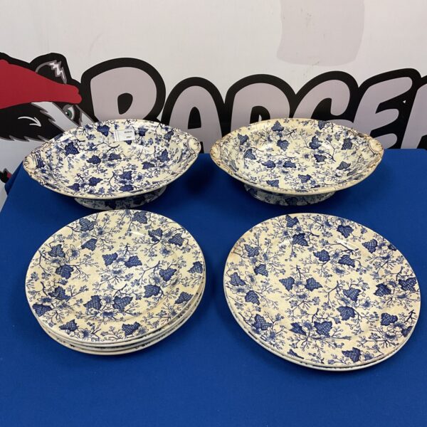 Antique Victorian hobon plate with blue and white pastoral scene.