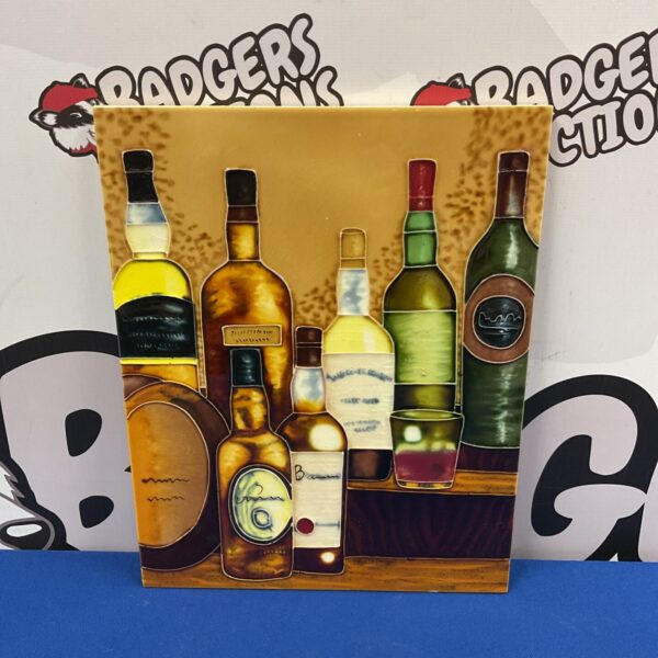 Colourful Benaya whisky montage ceramic tile for wall decor.