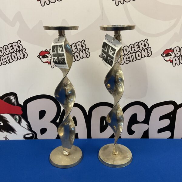 Pair of vintage silver plate spiral candlesticks for home decor.