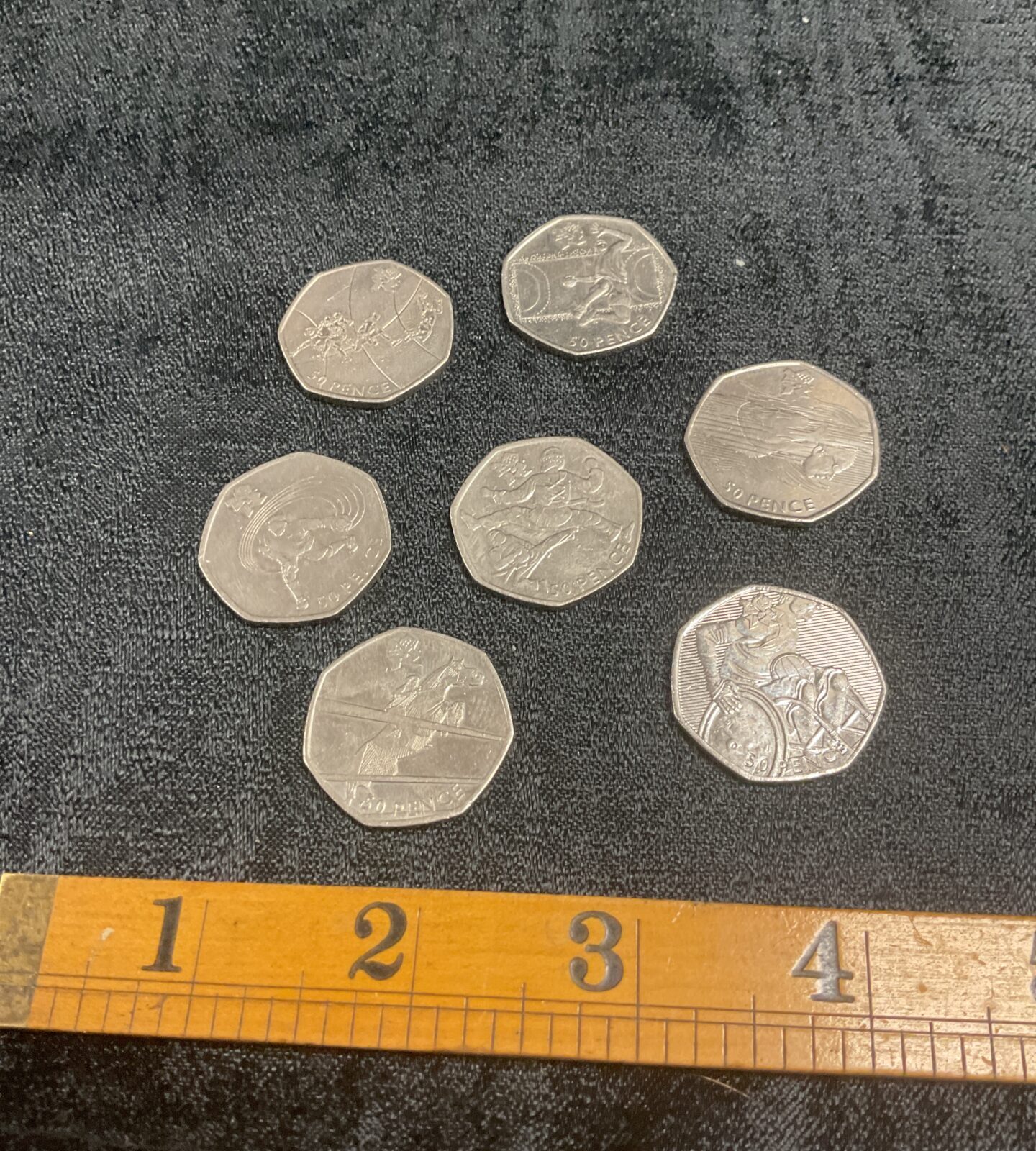 seven 2011 Olympics 50p coins