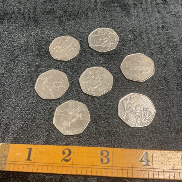 seven 2011 Olympics 50p coins