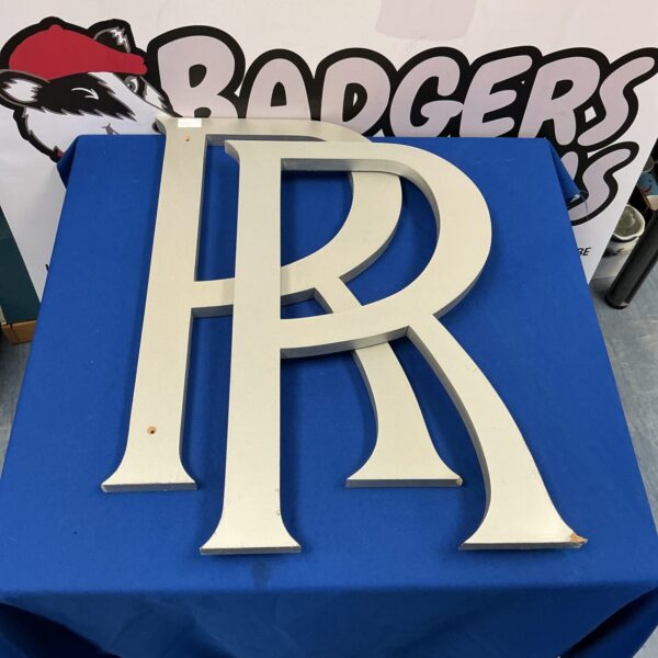 Vintage Rolls Royce wall sign for automotive decor and collectors.
