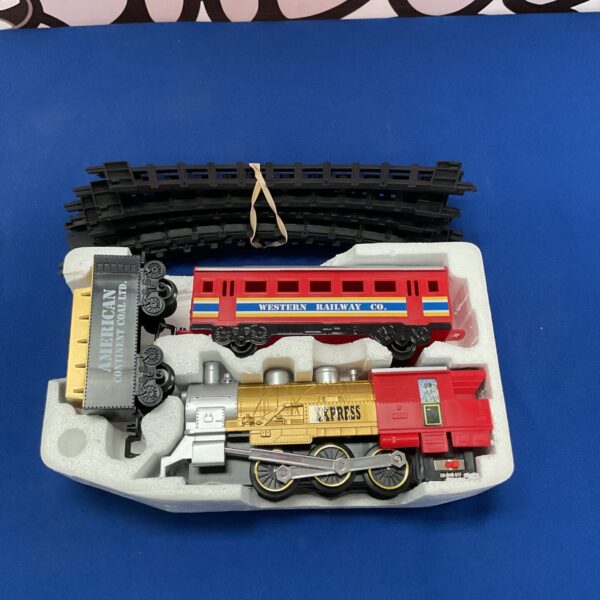 Vintage American Continental Express train set with track pieces.