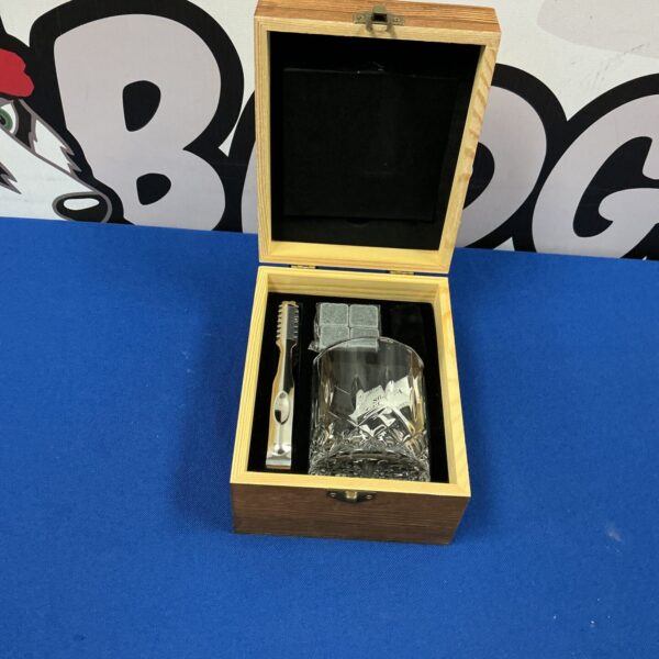 Open Vovzon whiskey stones set with tongs and stones inside box.