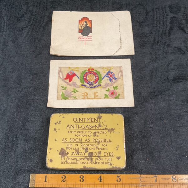 WWI Royal Engineers silk postcard and WWII anti-gas ointment tin.