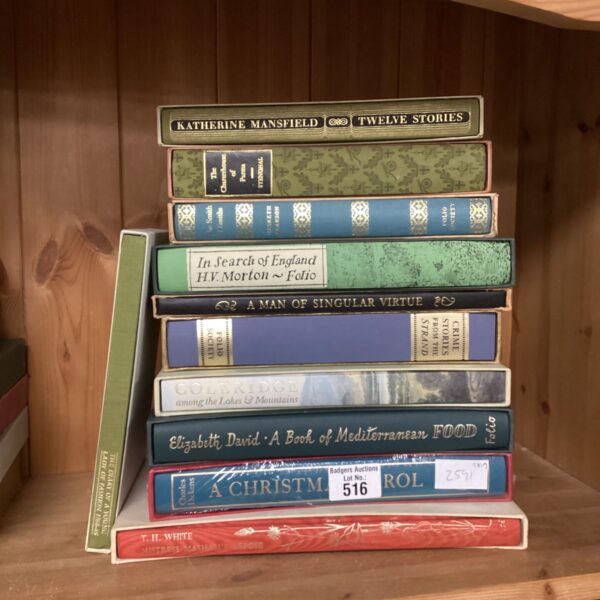 Bundle of Folio Society books including a sealed Charles Dickens edition.