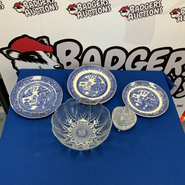 Vintage Willow Pattern plates and clear glassware collection.