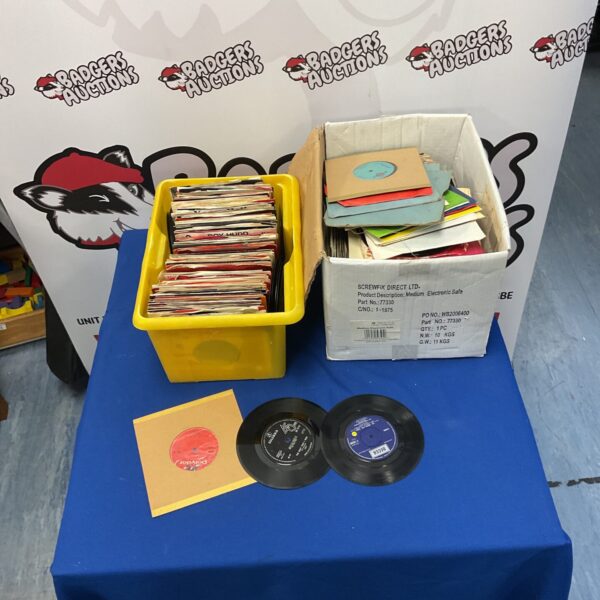 Two boxes of vintage EP records for collectors.
