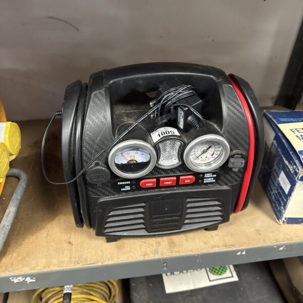 Car jump starter pack model 1005 with pressure gauge.