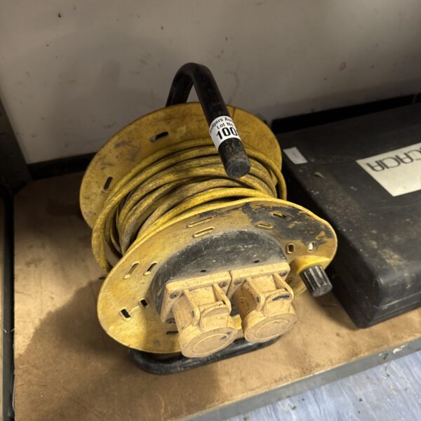 Two-gang 110v extension reel for workshop power.
