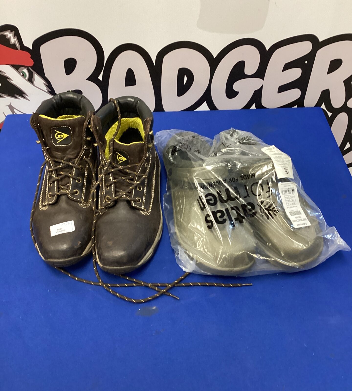 Pair of dunlop steel toe capped boots size 10 with atlas garden slippers