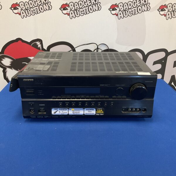 Onkyo TX-SR607 AV receiver front view, vintage home cinema equipment.