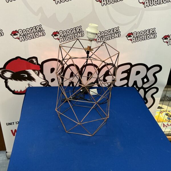 Vintage geometric metal table lamp with modern design.