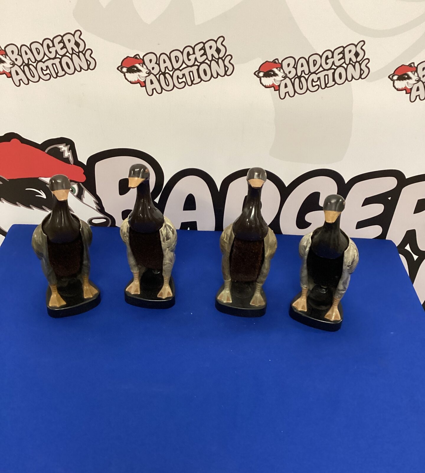 Four Vintage Bakelite Duck Clothes Brushes