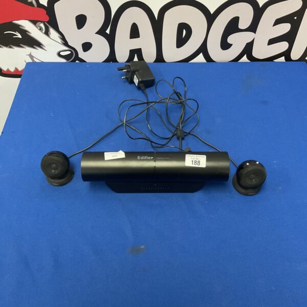 Black Edifier multimedia speakers for computer audio setup.