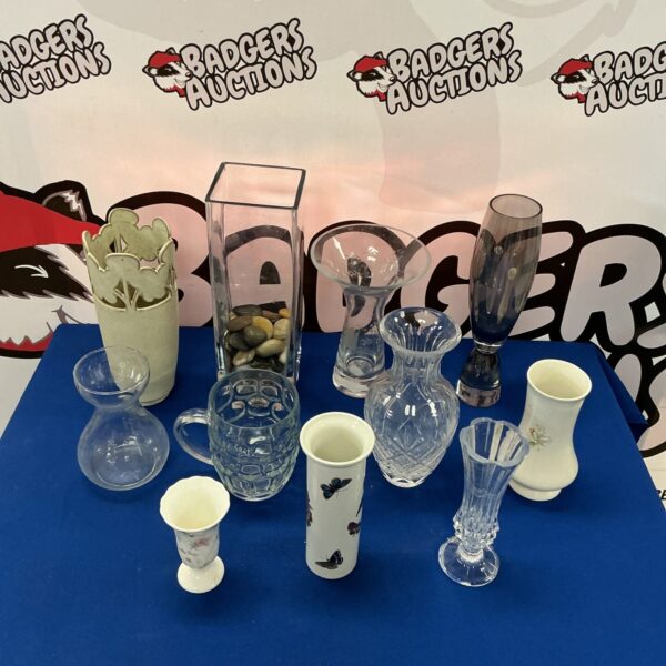 Vintage vase collection featuring ceramic and glass designs.