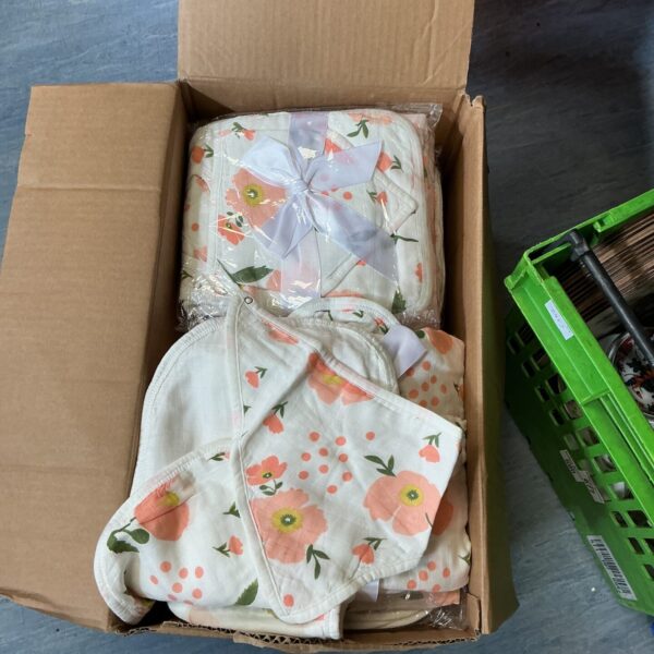 New muslin swaddle blankets with a floral pattern for babies.