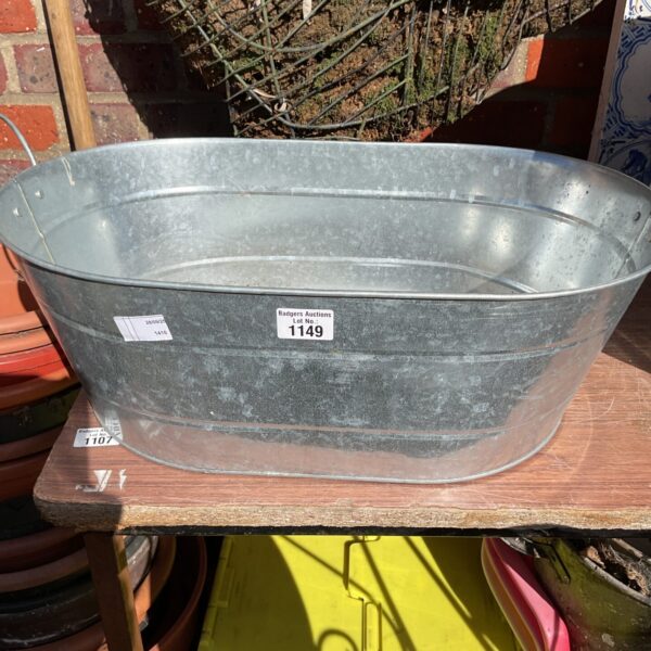 Vintage galvanised oval tub, ideal for garden or farmhouse use.