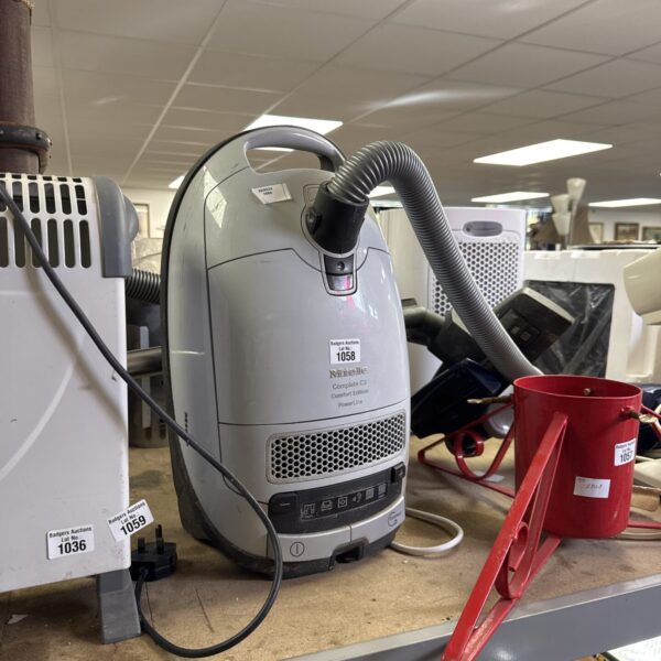 Miele C3 Comfort Edition vacuum cleaner in grey.