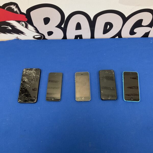 Bundle of old iPhones with one cracked screen.