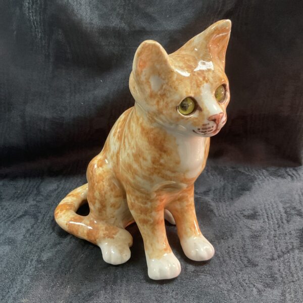 Vintage Winstanley cat figurine, side view, tabby cat pottery.