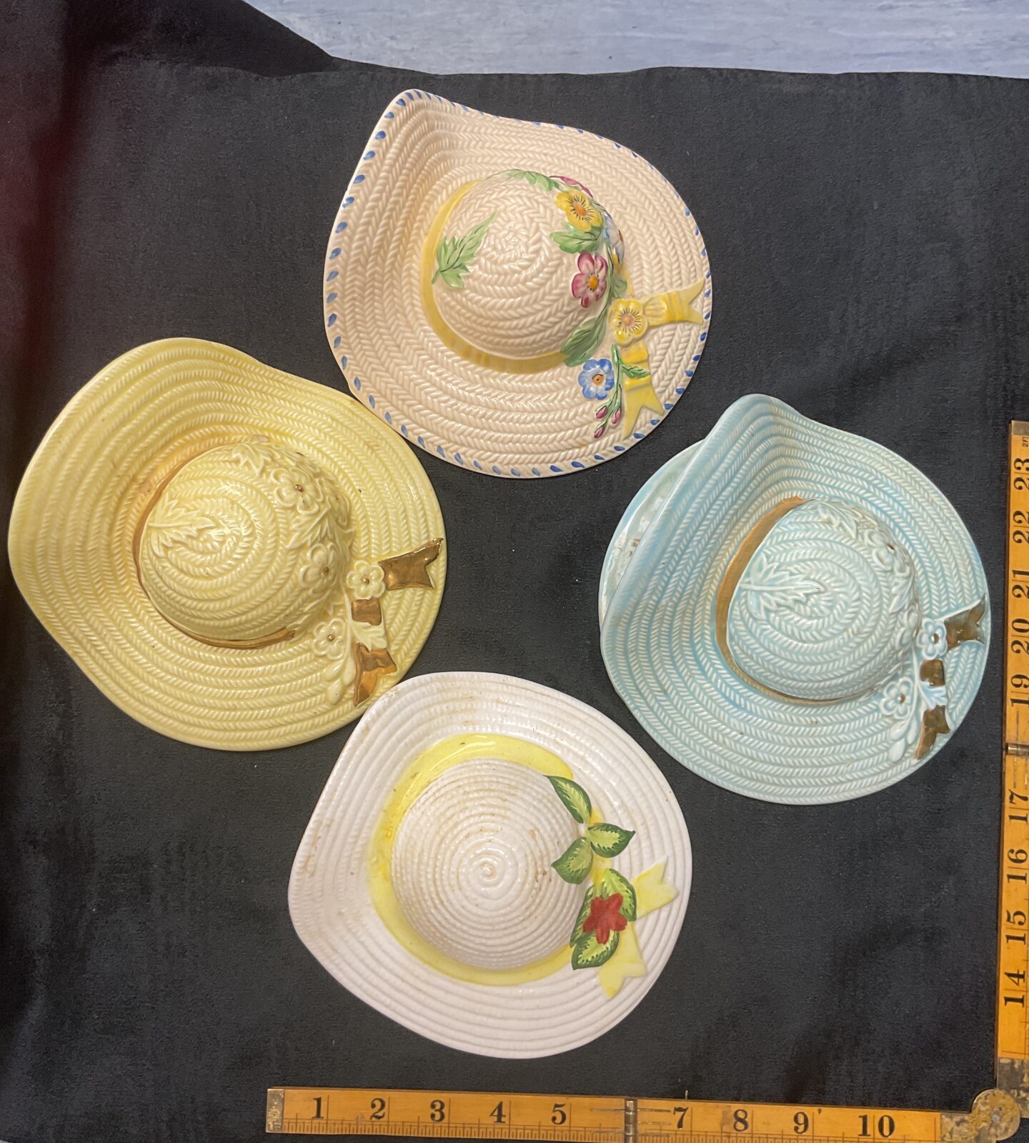 four Solian ware dolly varden straw hat wall pockets circa 1930