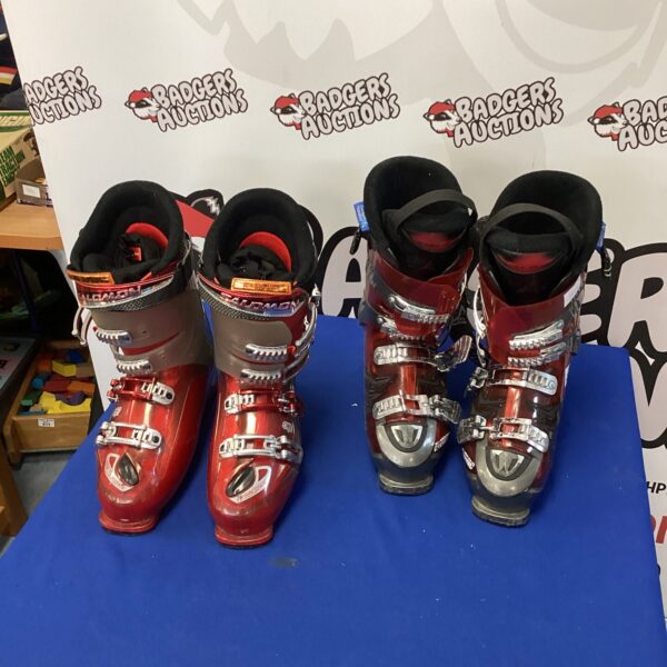 Two pairs of Salomon ski boots, size 28, for winter sports.