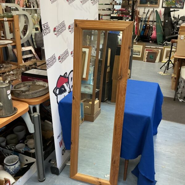 Antique tall pine framed mirror for farmhouse decor.